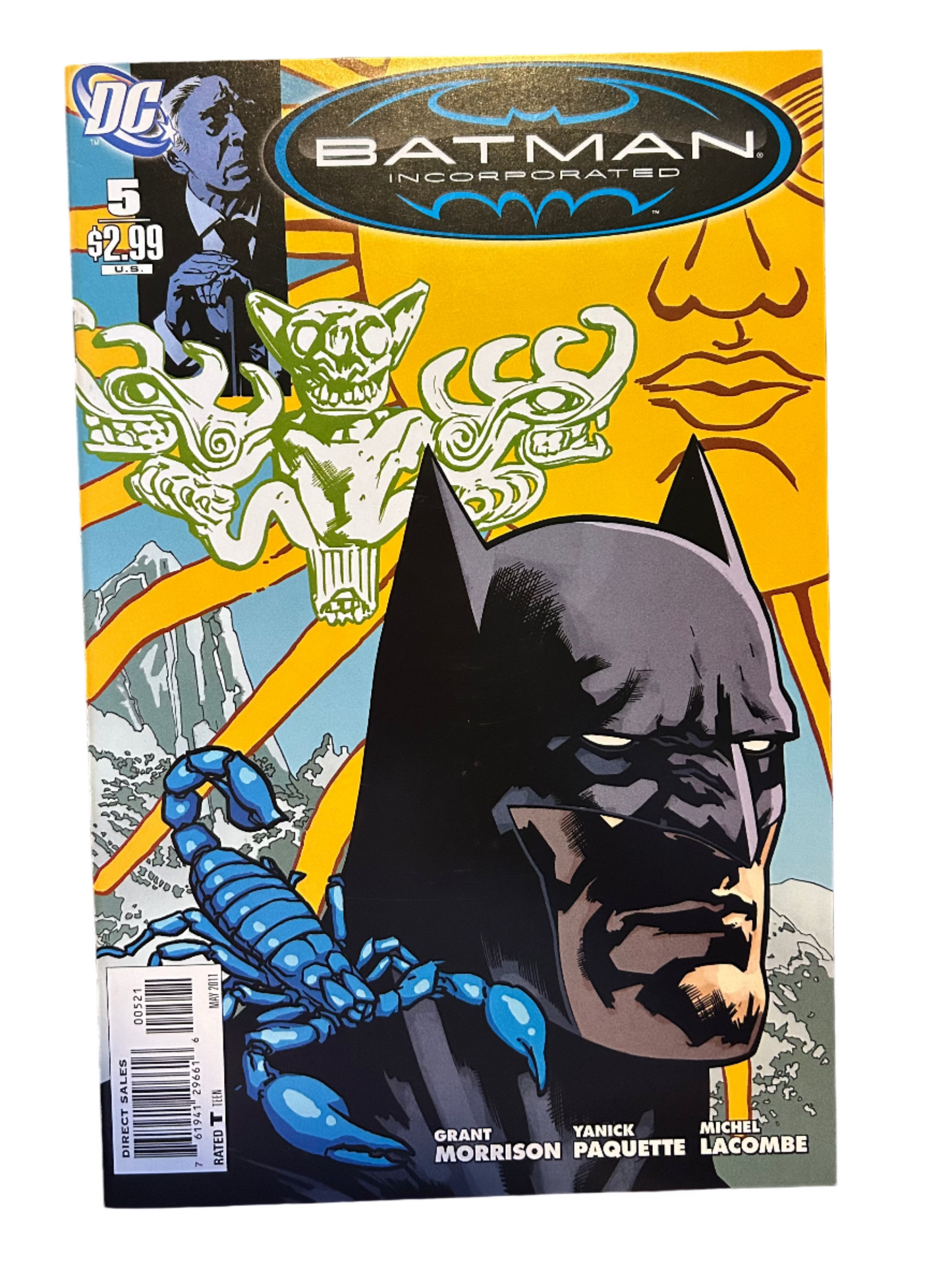 Comic book cover featuring Batman on a wooden surface