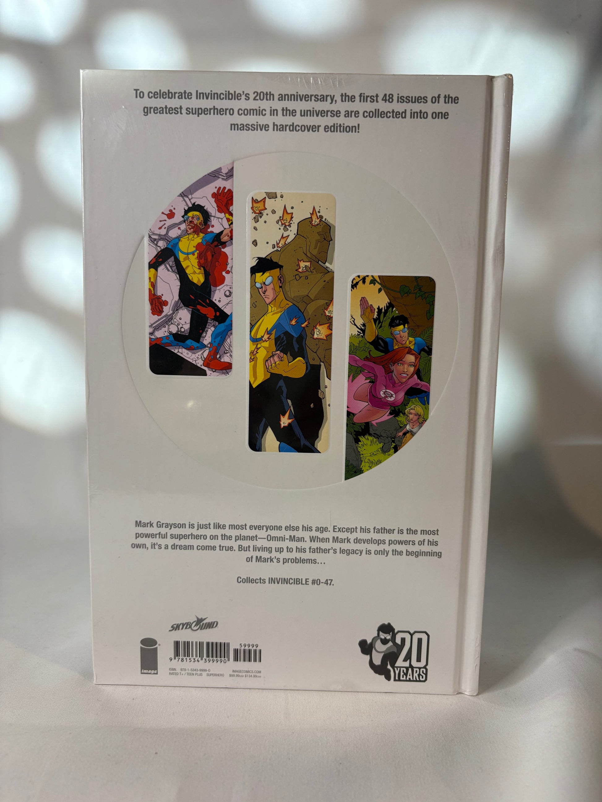 Invincible hardcover compendium spines showing volume 1 2 3