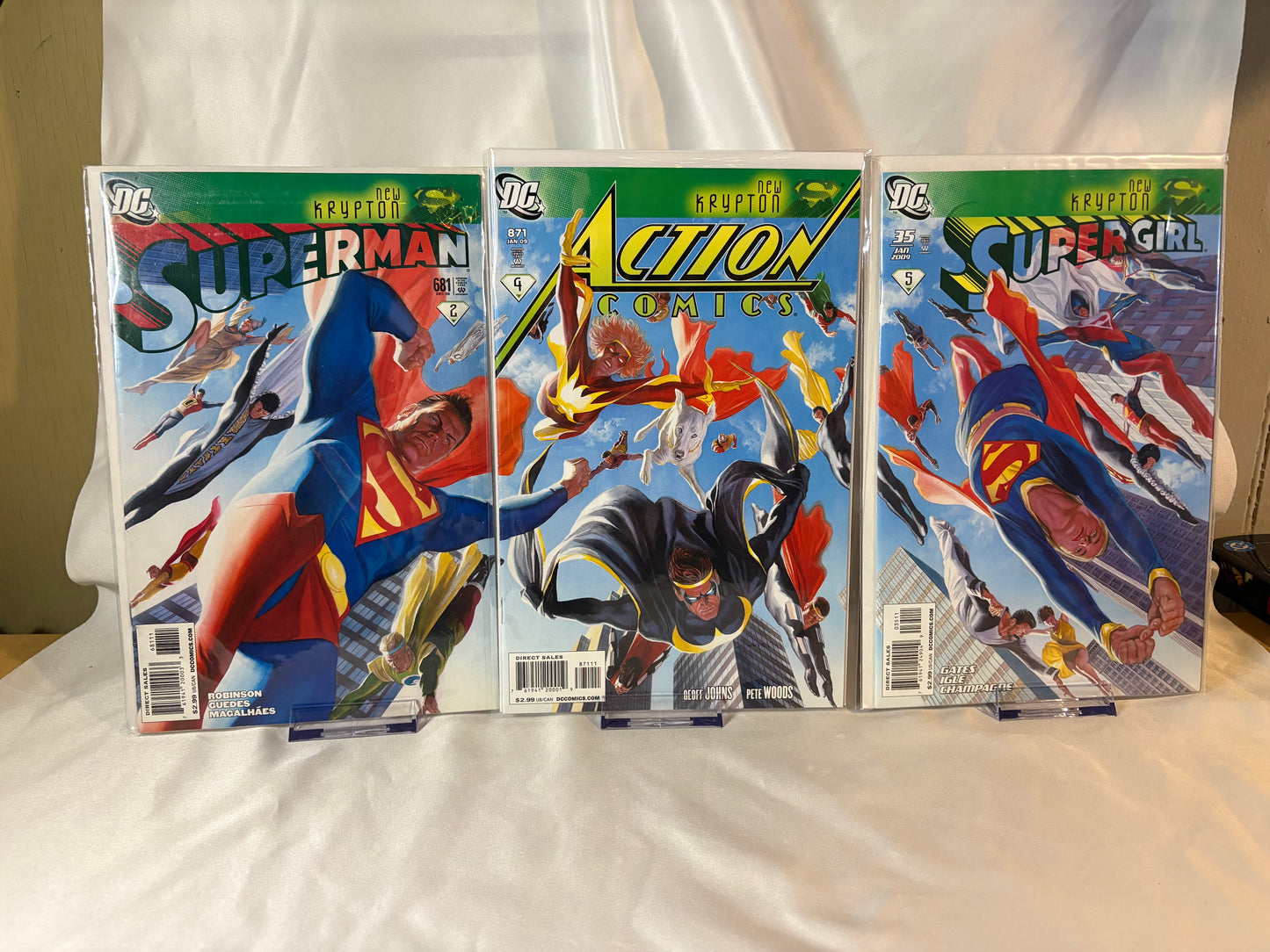 Superman #681, Action Comics #871 & Supergirl #35 – Alex Ross Connecting Cover Triptych Set (New Krypton, DC 2008–09)