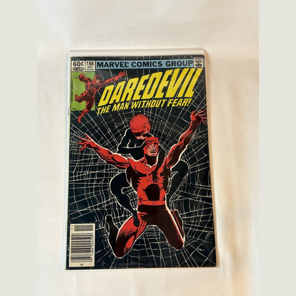 Daredevil #188 (1982) newsstand edition comic book front cover by Frank Miller, Black Widow spiderweb cover