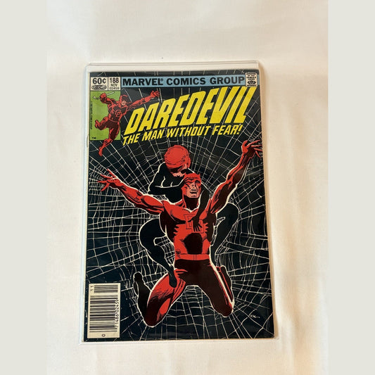 Daredevil #188 (1982) newsstand edition comic book front cover by Frank Miller, Black Widow spiderweb cover