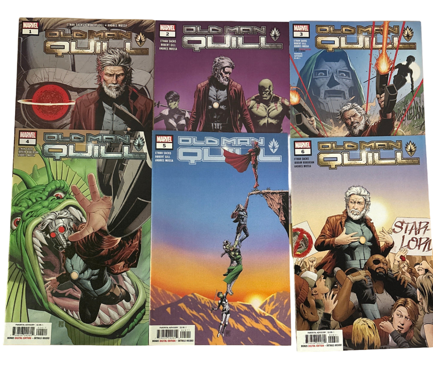 Collection of comic book covers on a wooden surface