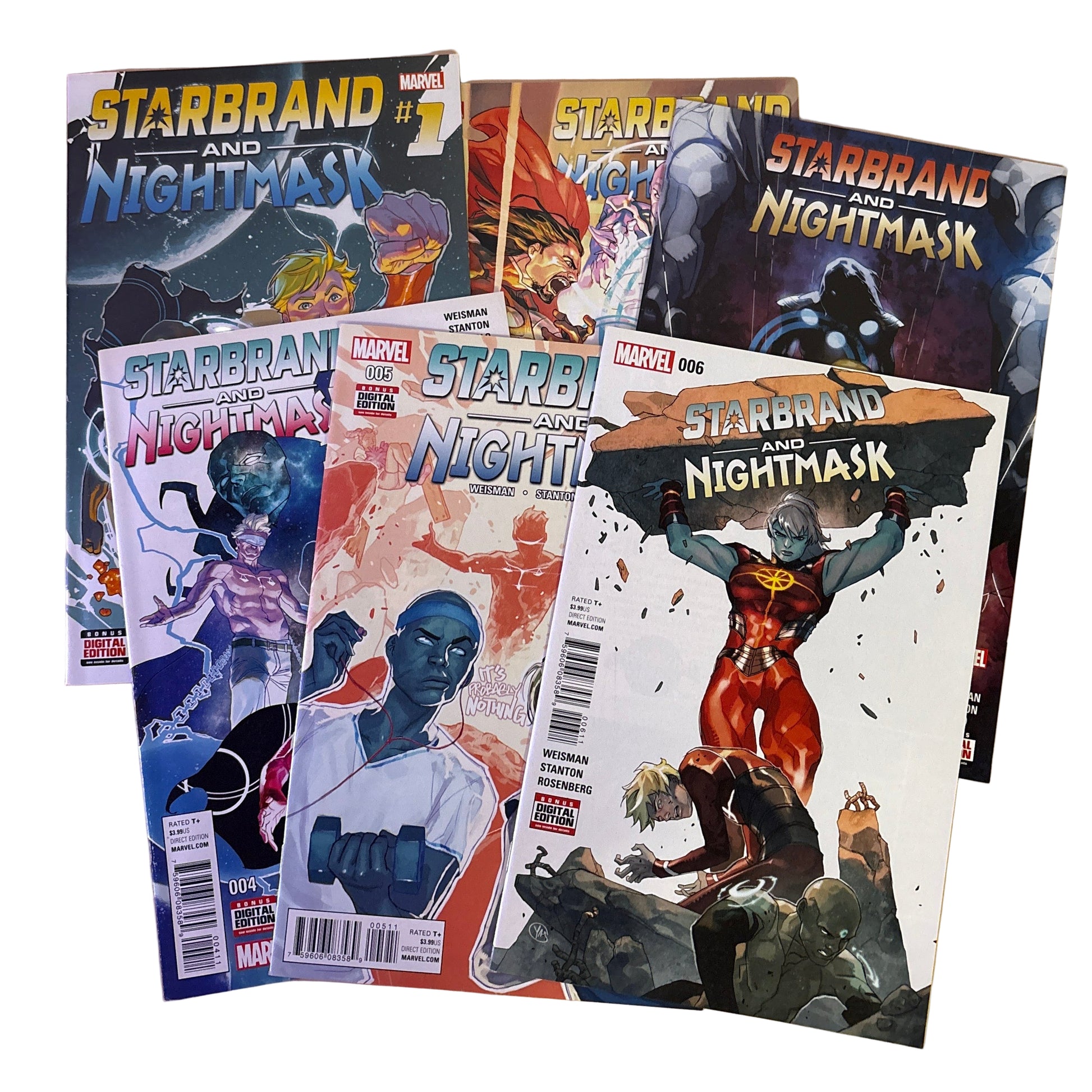 Comic books featuring Starbrand and Nightmask on a wooden surface.