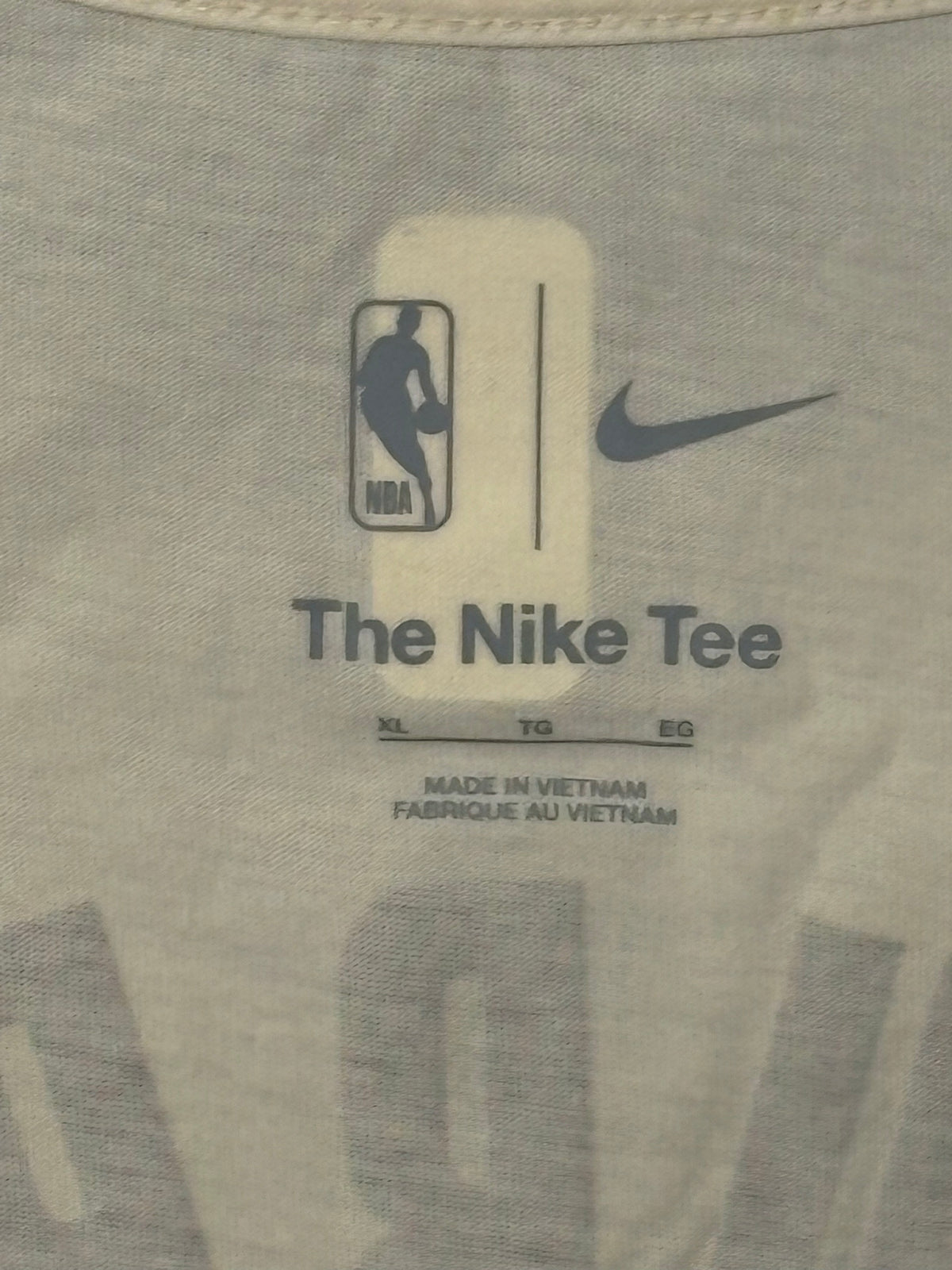 Nike Warriors tee size tag