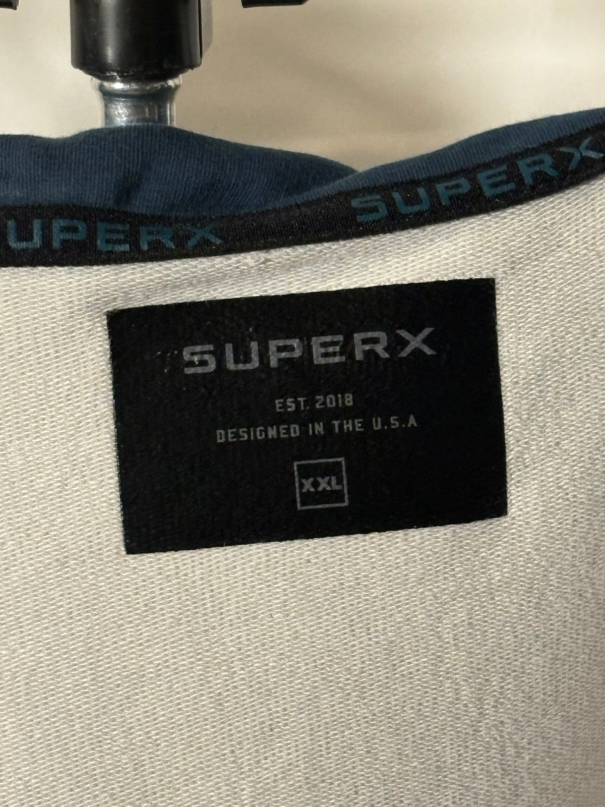 SuperX hoodie size tag